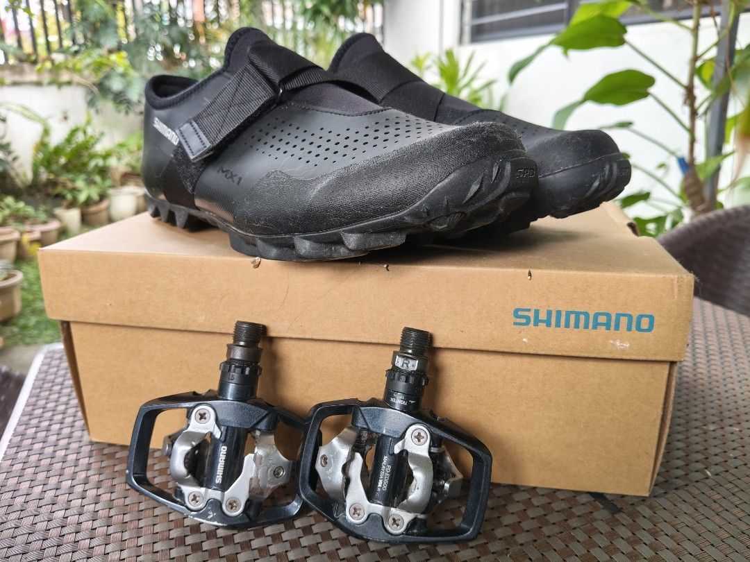Shimano MX1 + Shimano ED500 Cleats (Category: Bicycles) located in Makati City. Submitted by joel_888 (Listing ID 1415464422, Image 3). Description: 5x used only. No issues. size 9 09175604969 for faster transaction.