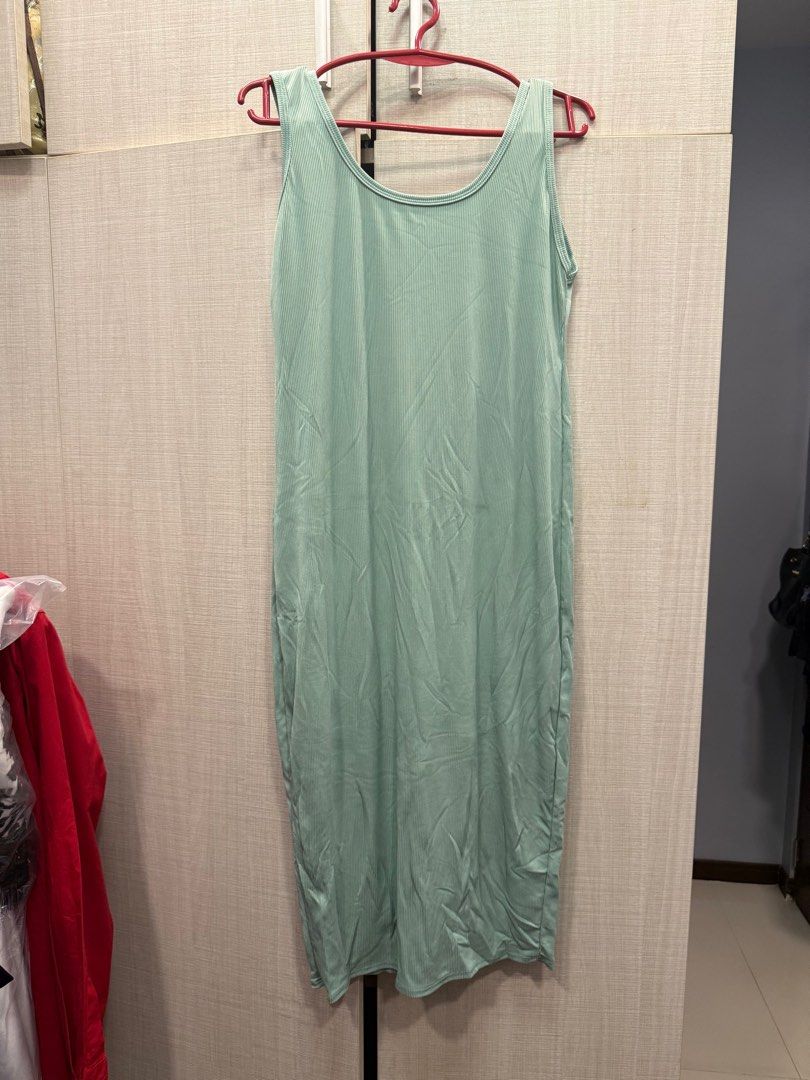 Sleeveless Midi Maternity Dress (Category: Dresses) located in Quezon City. Submitted by anj_chan (Listing ID 1415511142, Image 3). Description: - Sleeveless midi dress - Available colors: beige, burgundy, mint green, white, gray - Features a scoop neckline - Straight, body-hugging silhouette - Smooth, likely stretchy fabric - Perfect for layering Fits M-XL Take all 5pcs 600.