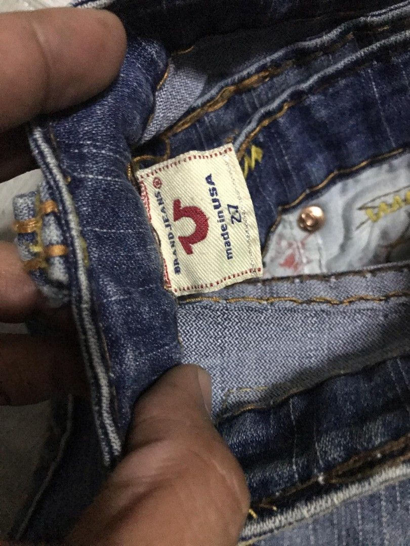 True Religion Jeans - Size 27 (Category: Jeans) located in Paranaque City. Submitted by jayson193 (Listing ID 1415484705, Image 2). Description: - Authentic True Religion jeans - Size 27 - Classic dark wash - Signature stitching - Button-closure back pocket - Made in the USA - Stylish and comfortable.