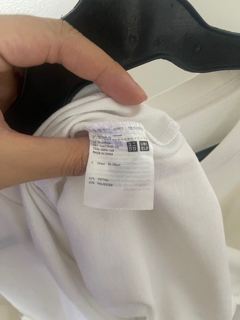Uniqlo White T-Shirt (Category: Tshirts & Polo Shirts ) located in Quezon City. Submitted by migspilapil (Listing ID 1415494063, Image 3). Description: The shirt has been well used, but is still wearable. Note the white mark in the neck area used for identification. This can be removed by thorough cleaning..