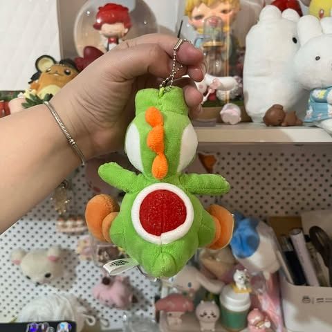 Universal Studios Super Mario Yoshi Plush Charm Toy (Category: Plushies & Soft Toys) located in Bocaue. Submitted by ekaaam (Listing ID 1415587420, Image 2). Description: WYSIWYG Please manage your expectations as this is already 2nd hand Color may vary due to lighting Kindly ask for more photos or send a message if you have any queries.