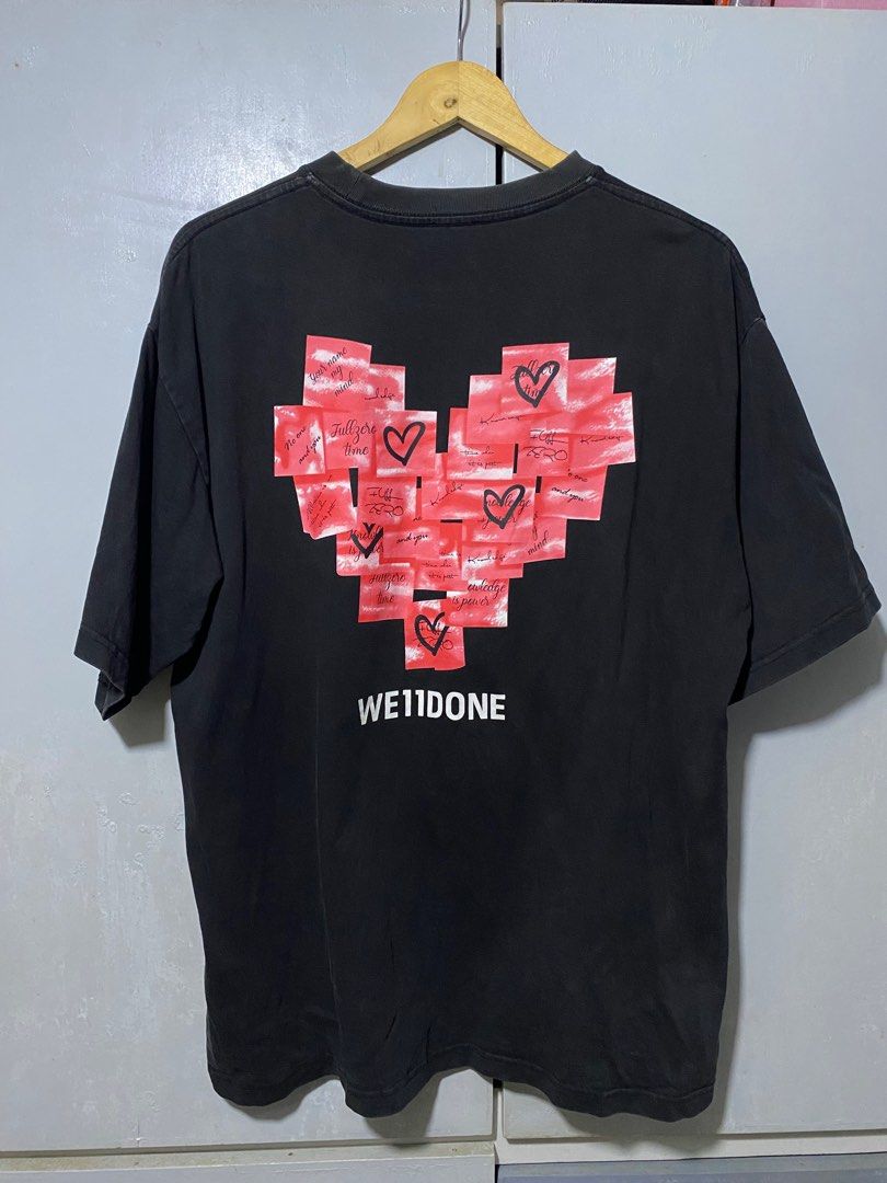 We11done Heart Graphic T-shirt (Category: Tshirts & Polo Shirts ) located in San Fernando. Submitted by sthriftven (Listing ID 1415586284, Image 3). Description: WE11DONE PINK HEART W: 22 L: 28 Good Condition Color rate: 8/10 issue: none CLAIM: 400.