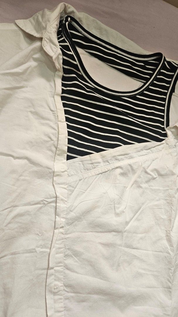 White polo top with Striped Inner off-shoulder (Category: Blouses) located in Davao. Submitted by bvxbmvn (Listing ID 1415527156, Image 3). Description: White polo top with a striped black and white inner, slight off shoulder design best fit Medium-Semi-Large perfect for warm weather, beach wear lightweight fabric, slight see-through all clothing items are washed before packing and sending, thank you! rfs: decluttering can give discount if buying