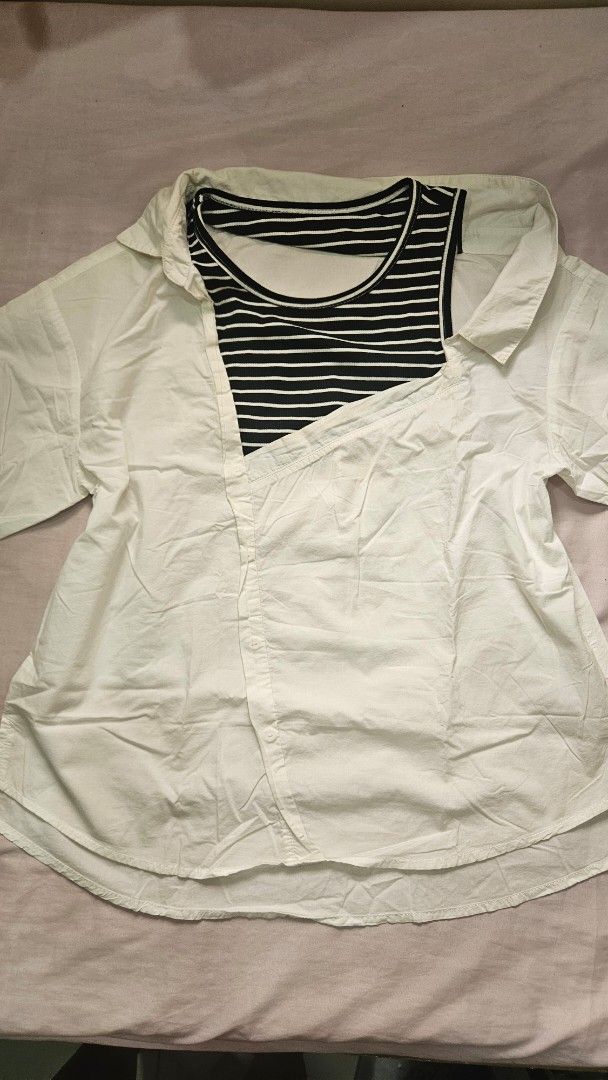 White polo top with Striped Inner off-shoulder (Category: Blouses) located in Davao. Submitted by bvxbmvn (Listing ID 1415527156, Image 1). Description: White polo top with a striped black and white inner, slight off shoulder design best fit Medium-Semi-Large perfect for warm weather, beach wear lightweight fabric, slight see-through all clothing items are washed before packing and sending, thank you! rfs: decluttering can give discount if buying