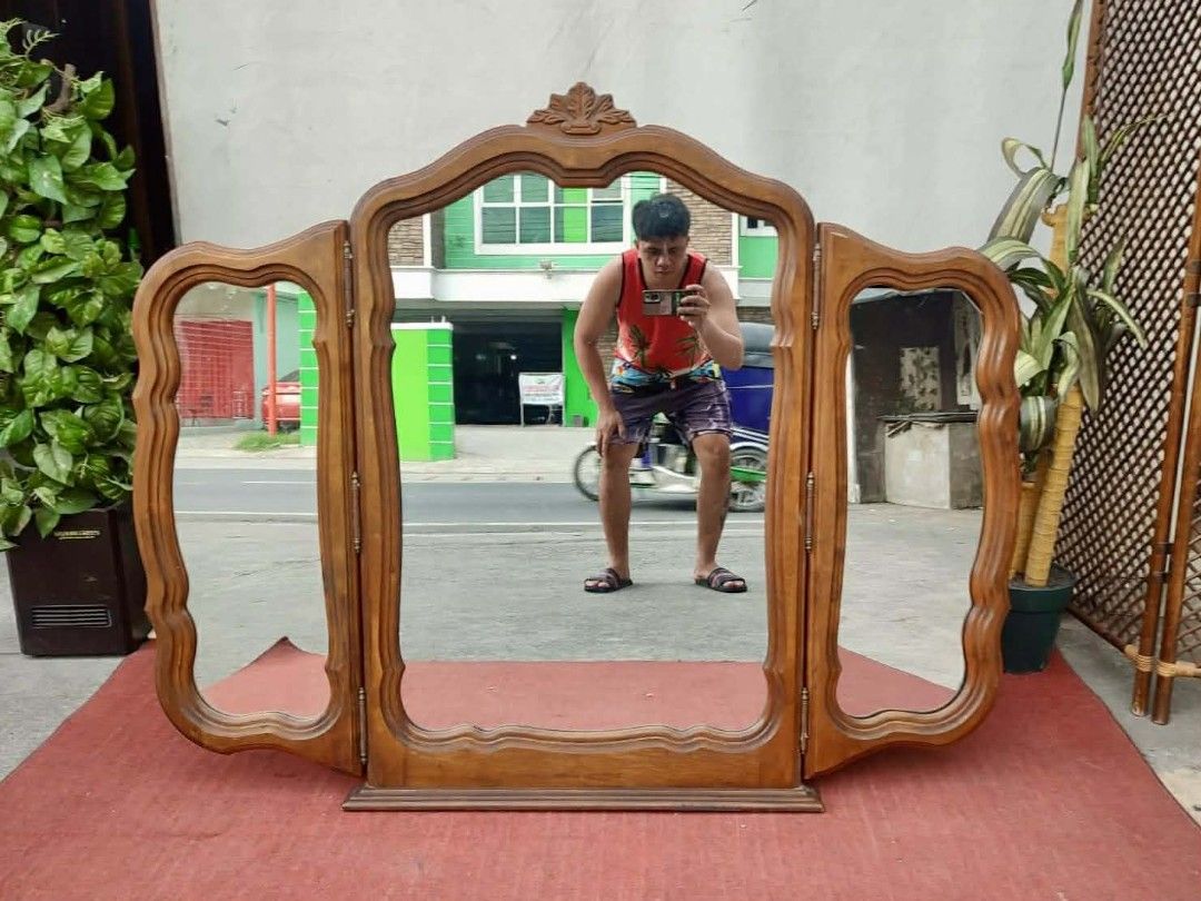 Wooden Tri-Fold Mirror (Category: Mirrors) located in Valenzuela. Submitted by princeraya55649 (Listing ID 1415621829, Image 1). Description: Elegant Solid Wood Tri-Fold Table Top Mirror 51"L x 46"H Php 8,200.