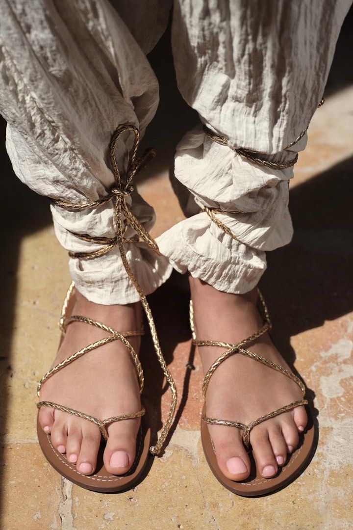 Zara Braided Strap Sandals (Category: Flats & Sandals) located in Makati City. Submitted by MyPurchases2021 (Listing ID 1415593417, Image 2). Description: Zara sandals with brown footbed and gold braided straps. Features a thong style toe and ankle wrap. Unworn..