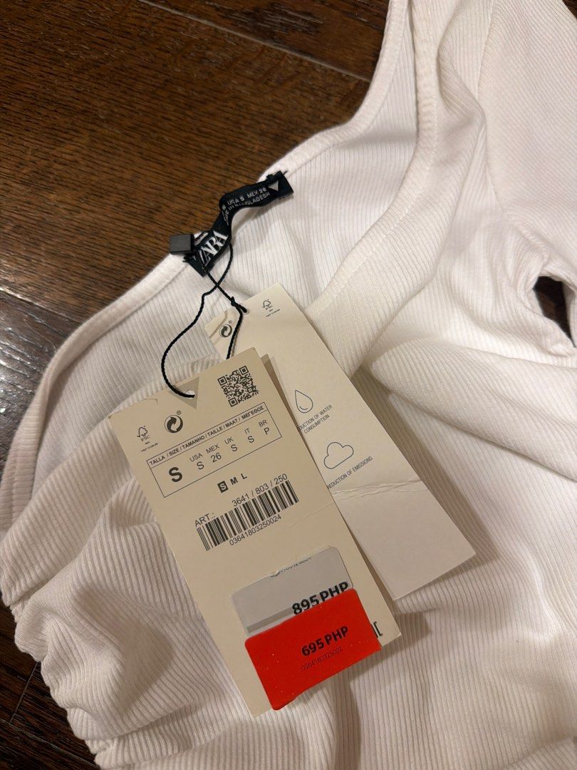 ZARA White One Shoulder Longsleeve Top (Category: Longsleeves) located in Quezon City. Submitted by lililiadluns (Listing ID 1415475043, Image 3). Description: - Brand new never worn - Super cute, one shoulder and cropped.
