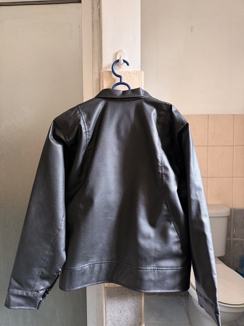2timestoo Black Boxy Leather Jacket Crop Style (Category: Coats, Jackets and Outerwear) located in Taytay. Submitted by azlux (Listing ID 1415671992, Image 2). Description: 2timestoo Black Boxy Leather Jacket Cropped Style Super High Quality Vegan Leather Black L: 24.5" W: 23" Sleeves: 24" - Used once wrong size on me - Limited only and not being sold anymore specifically for a size Medium. Very niche brand from Indonesia you van check their Ig 2