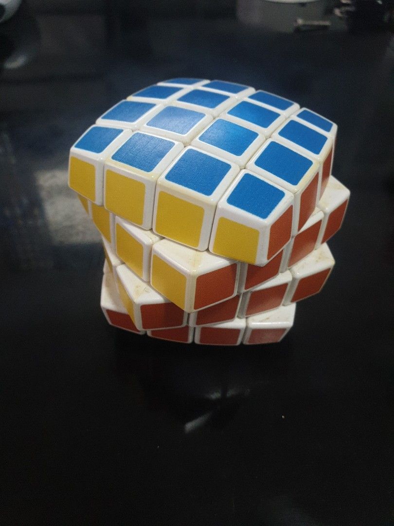 4x4 VCube Rubik's Cube (Category: Board Games & Puzzles) located in Las Pinas. Submitted by mmff_88 (Listing ID 1415658909, Image 2). Description: 4x4 pillowed Vcube bought at Fullybooked several years ago. Turns as well as it did new. Slight yellowing on pieces (see pic 2), but is in very good condition overall. Negotiable if we meetup and you solve it live..