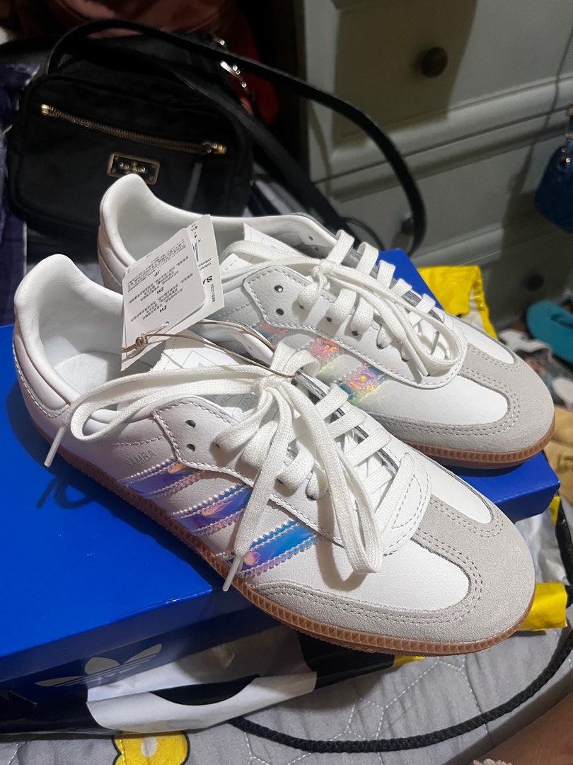 Adidas Samba OG J Sneakers (Category: Sneakers) located in Paranaque City. Submitted by maineshar19 (Listing ID 1415805117, Image 1). Description: - Adidas Samba OG J sneakers - White with iridescent stripes - Suede toe cap - Gum sole - New with tags - Size: UK 4.5 / US 4 / EU 36 2/3 / JP 230-225 - Includes original box.