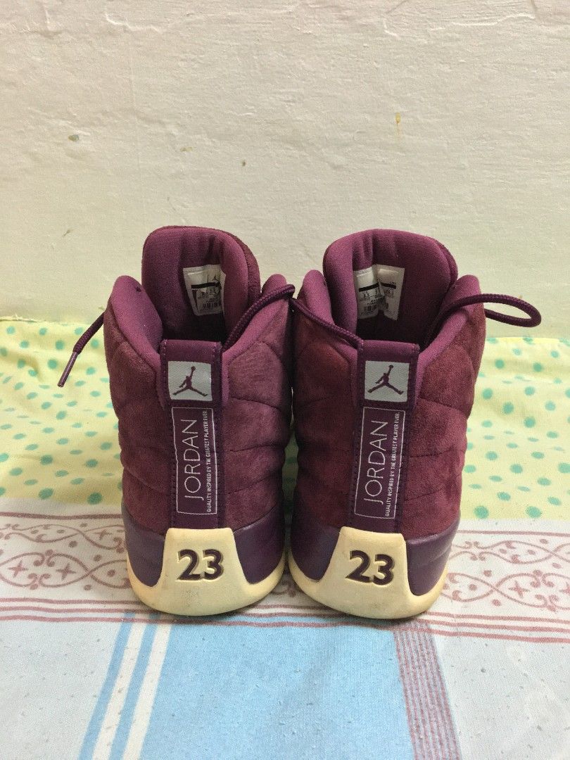 Air Jordan 12 Retro Bordeaux (Category: Sneakers) located in Quezon City. Submitted by 2high2cry. (Listing ID 1415677671, Image 3). Description: - Air Jordan 12 Retro - Burgundy colorway - Size: 8.5 US - Iconic Jumpman logo - '23' detail on sole - Suede-like upper - Cream-colored sole - Made in 2017 kita na po mga issue sa pics. 4-5 times ko lang siya nagamit, nastock lang po siya ng matagal. may sole sep na rin siya NEGOTIABLE, madali po ako kau