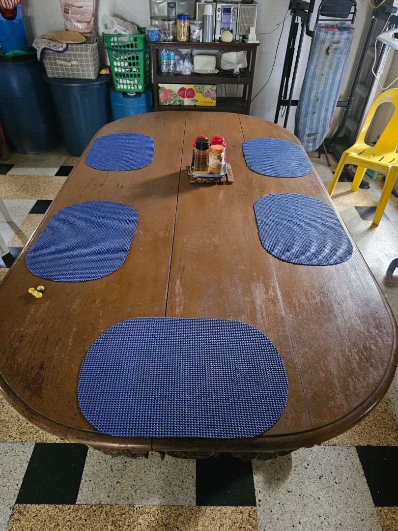 Antique Wooden Dining Table (Category: Tables & Sets) located in Quezon City. Submitted by zeyanne (Listing ID 1415741249, Image 1). Description: - Antique wooden dining table - Oval shape - Unique carved design - Rich, warm wood tone - Sturdy, detailed base - Adds classic style to your dining area MOP: Gcash pick up only .