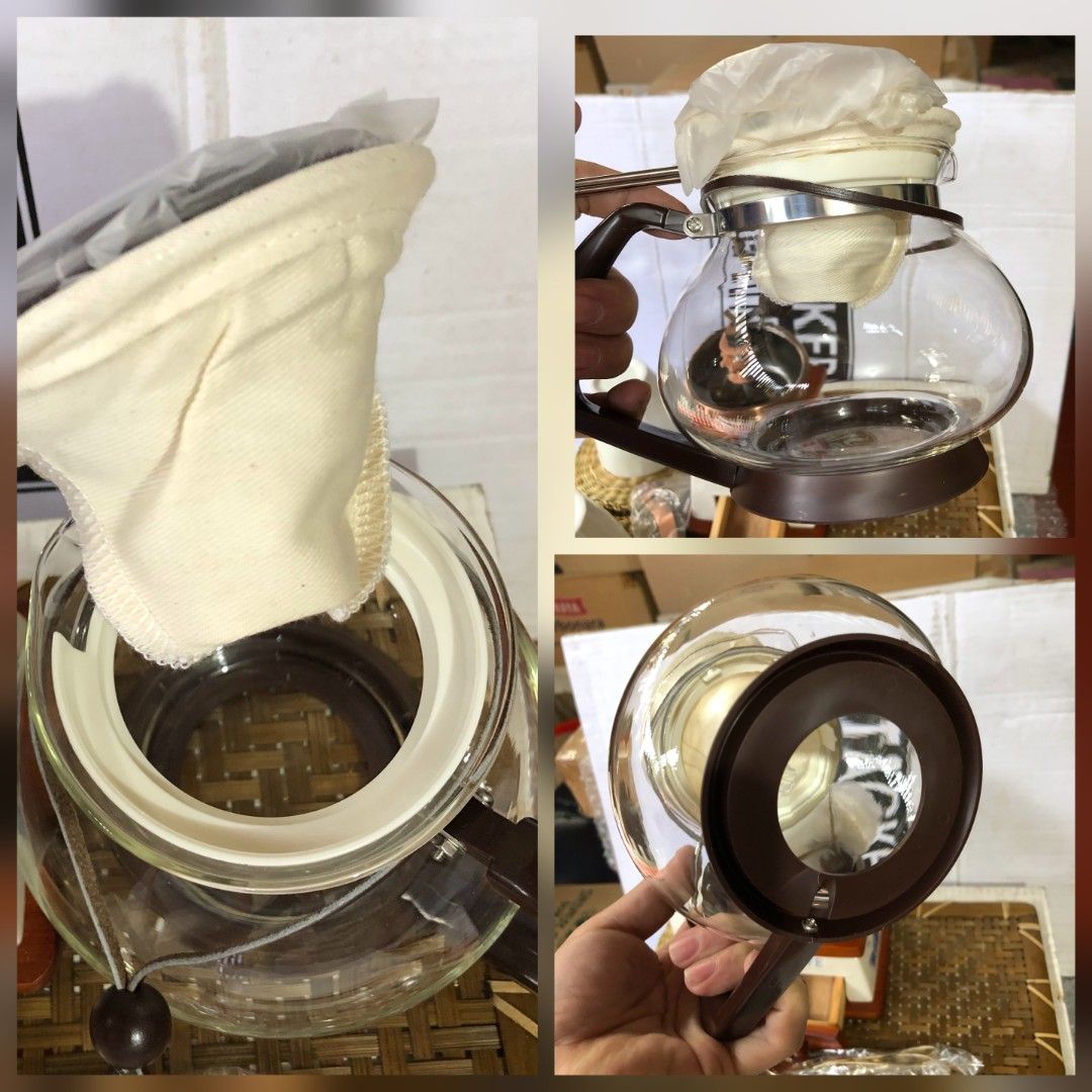 Asian Coffee Mill & Cafe Set KM-0011 (Category: Coffee & Tea Tableware) located in Caloocan City. Submitted by e_o62059 (Listing ID 1415818319, Image 3). Description: japan branded brand new;pristine condition;unused Complete vintage coffee set including a manual coffee grinderand brewing set, glass coffee pot with filter, two cups, and two spoons. The coffee grinder has a wooden base with a copper-colored top. The cups are white with a brown swi
