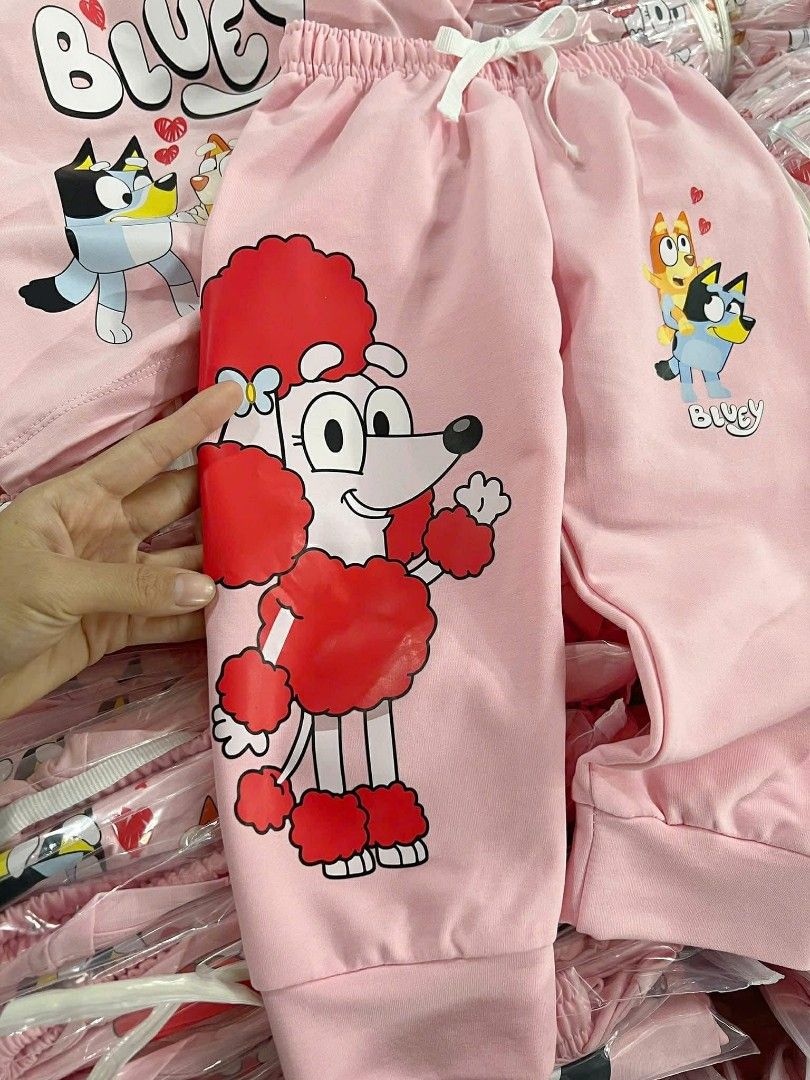 Bluey Pajama Set (Category: Babies & Kids Fashion) located in Manila. Submitted by aleicollection2 (Listing ID 1415814179, Image 2). Description: Bluey pajama set for kids! Includes a short-sleeved top and matching pants with ankle cuffs. Comes with a Bluey tag. available sizes 👇🏻 18-24m✅ 2-3y✅ 3-4y✅ 4-5y✅ 6-7y✅️ — ₱380💸 Made in Vietnam.