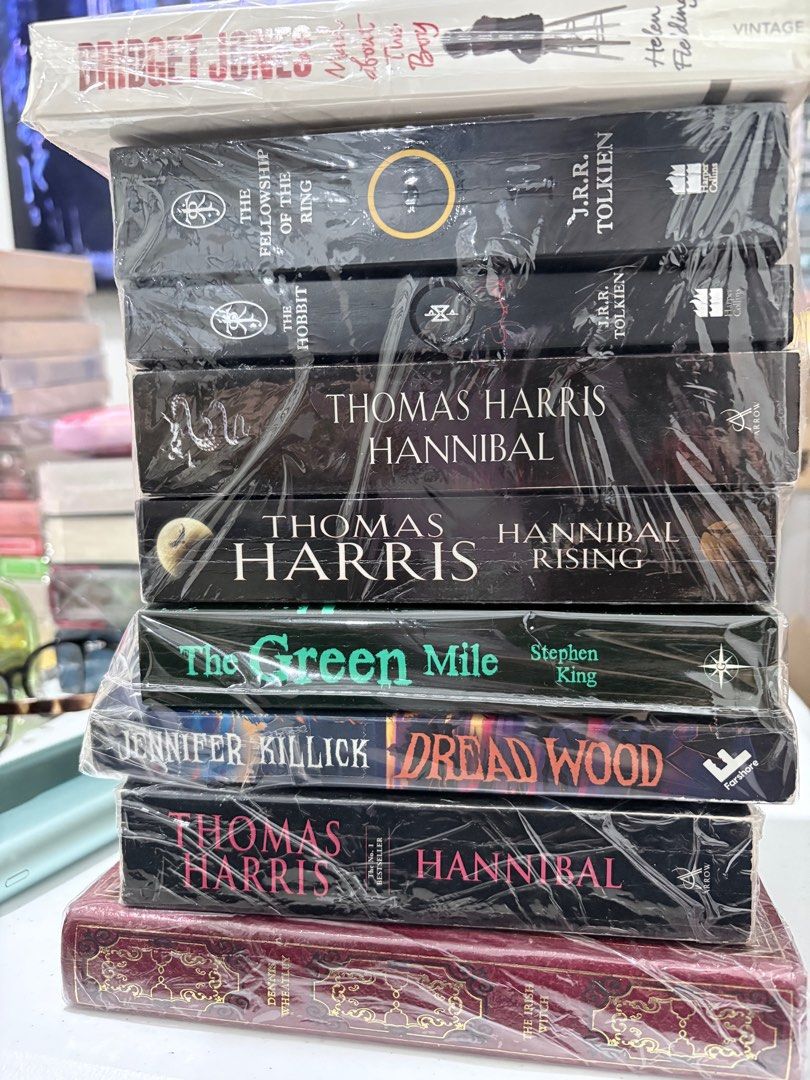Bundle Sale Thriller Books (Category: Storybooks) located in Mandaluyong City. Submitted by thebagpopulaire (Listing ID 1415817041, Image 1). Description: 💯 Authentic Books Sold as set. Book Titles on this Bundle : Bridget Jones Diary, Mad About The Boy - Helen Fielding The Hobbit - JRR Tolkien The Fellowship of the Ring - JRR Tolkien The Hannibal - Thomas Harris The Hannibal Rising - Thomas Harris The Hannibal (movie cover) - Thomas Harris Drea