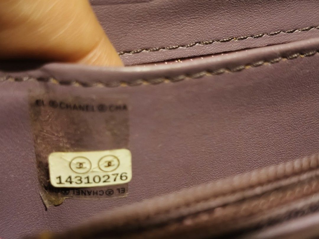 Chanel Quilted Zip Around Wallet (Category: Luxury Bags & Wallets) located in Lucena. Submitted by gwpsns_2026 (Listing ID 1415666487, Image 3). Description: - Authentic Chanel wallet - Brown color - Quilted design - Chanel logo - Zip closure - Serial number sticker included - Interior: lighter purple - Attached charm.