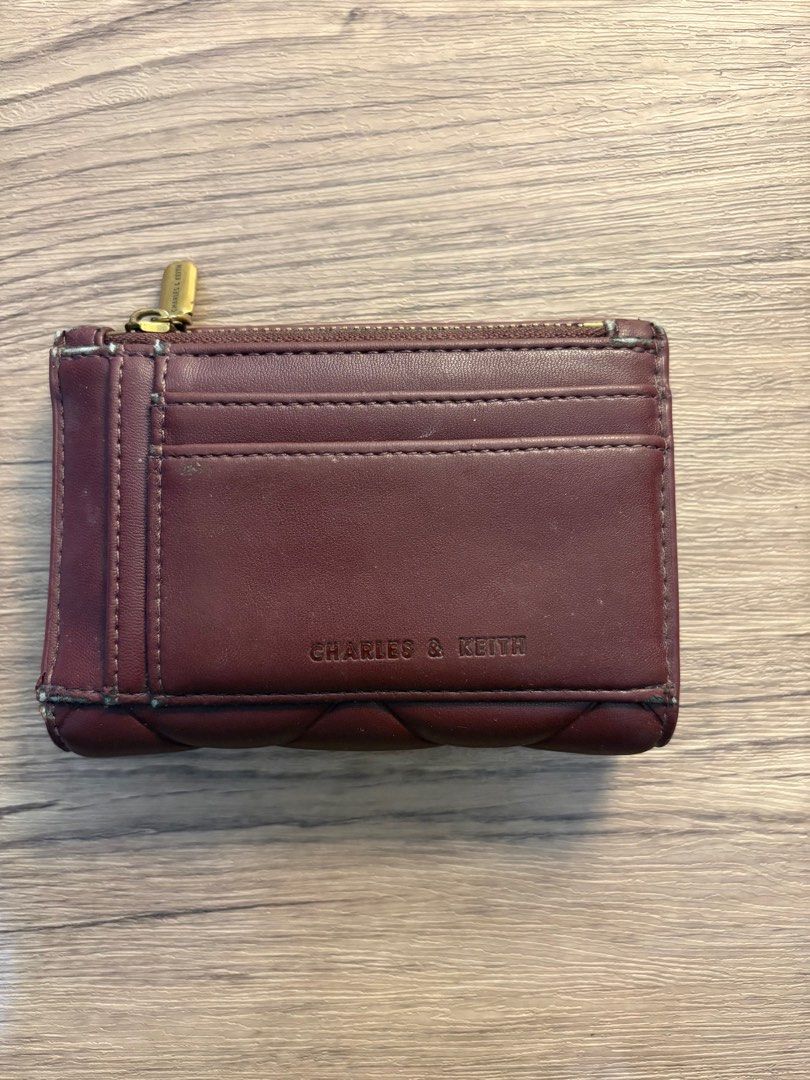 Charles & Keith Quilted Wallet (Category: Wallets & Card holders) located in Cainta. Submitted by joy-eux (Listing ID 1415807144, Image 2). Description: With box and paper bag Very nice for bills and cards Has flaws on the corners Easy to bring .