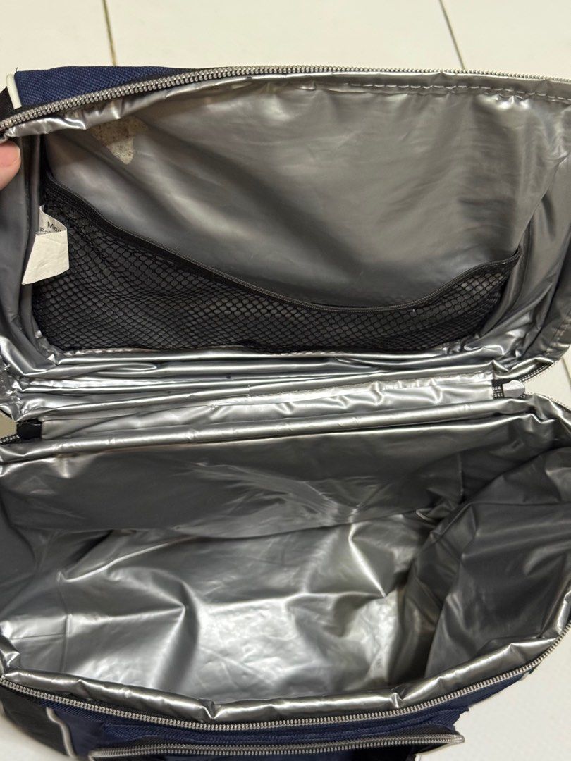 Coleman Go! Cooler Bag (Soft Cooler Bag) (Category: Hiking & Camping) located in Makati City. Submitted by dailysale_ph (Listing ID 1415774010, Image 3). Description: - Coleman Soft Cooler Bag - Bag has flaws and some tear as shown in the photos. Please manage expectations. - No return. No exchange..