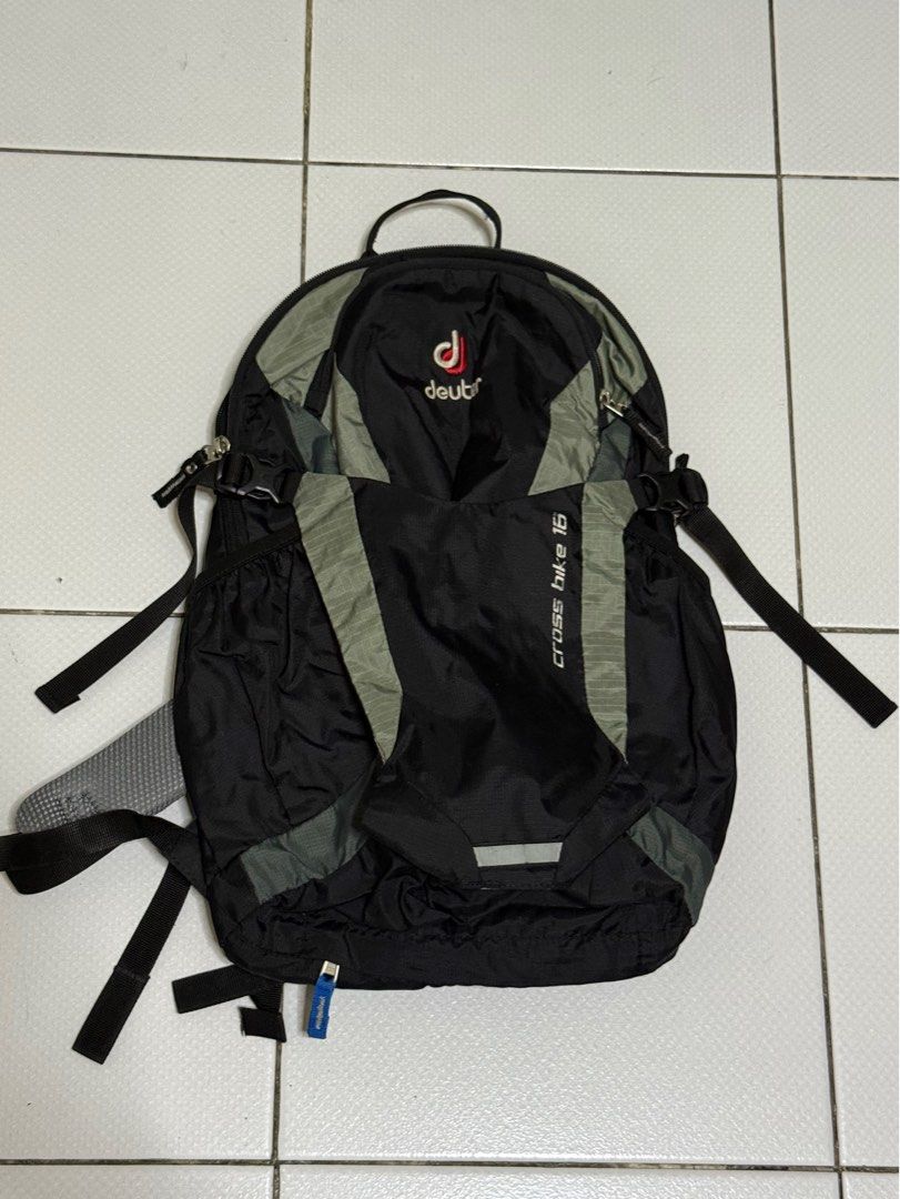 Deuter Cross Bike 18 Backpack (Category: Backpacks) located in Makati City. Submitted by dailysale_ph (Listing ID 1415772238, Image 2). Description: - Deuter Cross Bike 18 backpack - Color: Black and Gray - YKK zippers - Note: This is well used item. Please manage expectations. - Good for day hikes or biking - No return. No exchange..