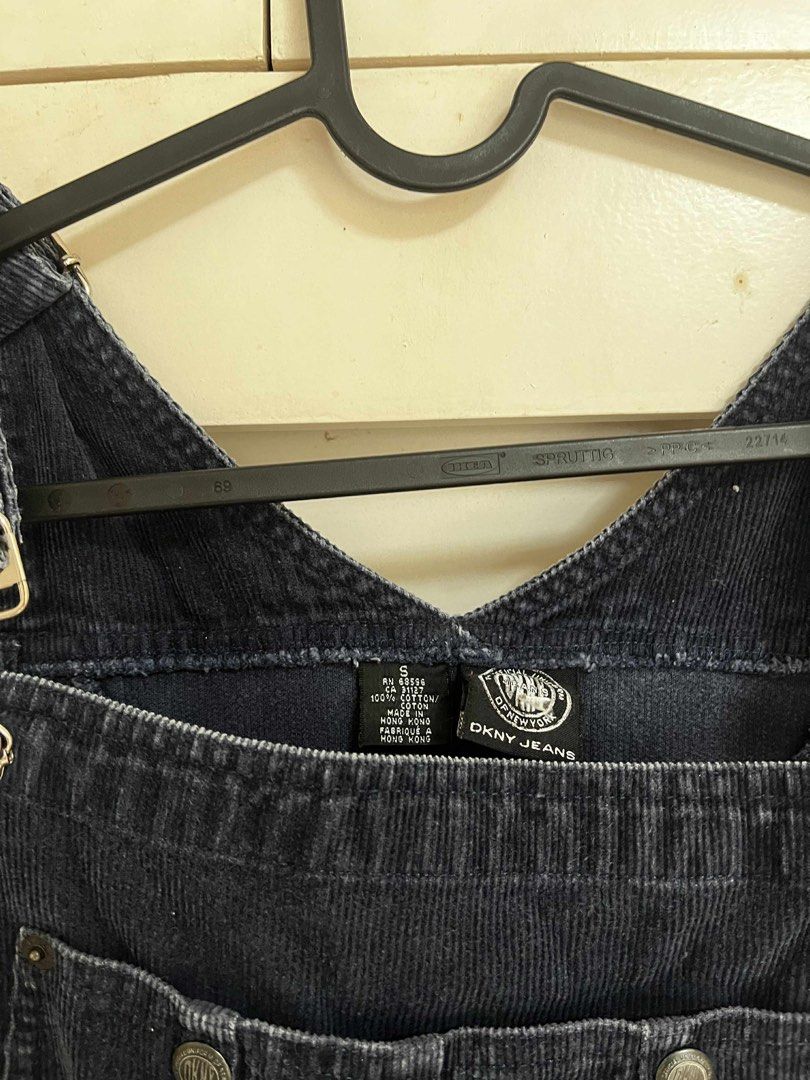 DKNY Jeans Corduroy Overalls (Category: Jumpsuits) located in Antipolo. Submitted by bengsk (Listing ID 1415816874, Image 3). Description: - DKNY Jeans corduroy overalls - Dark blue color - Size S - Adjustable straps - Multiple pockets - DKNY branded buttons - Overall length: approx. 57 inches - model is 5’4” with waistline of 75cm (29.5 inches).