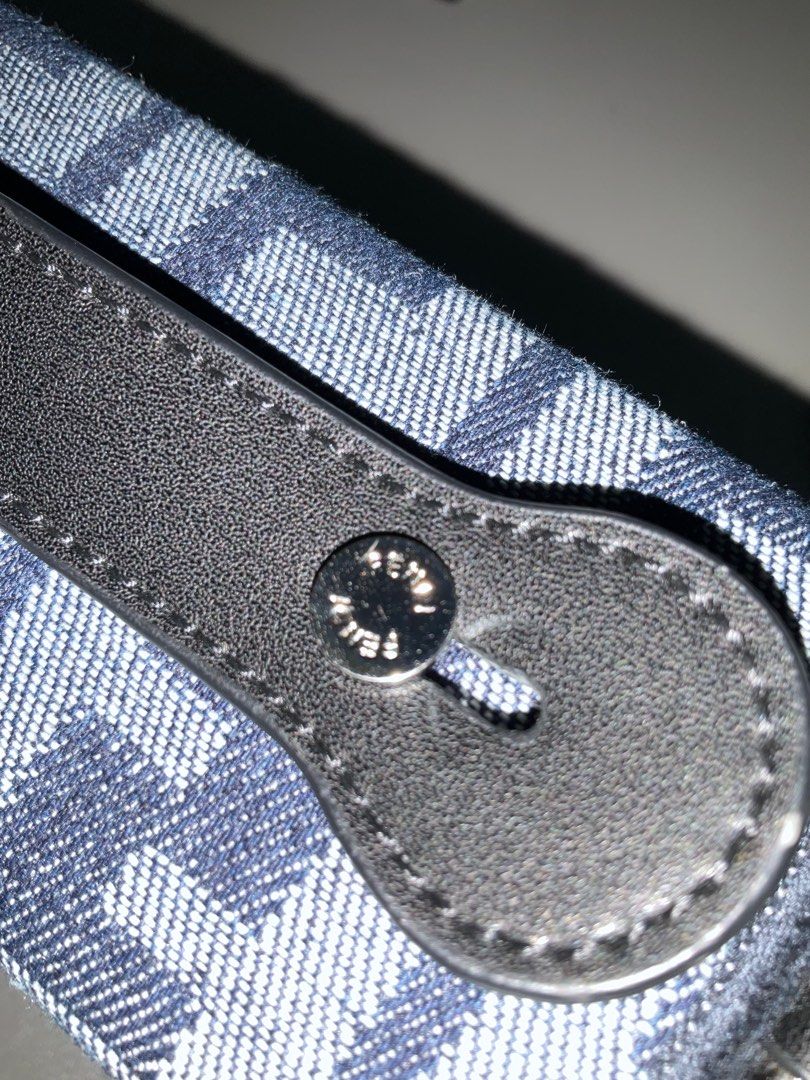 Fendi Denim Jacquard Soft Trunk Baguette Bag (Category: Luxury Bags & Wallets) located in Cabuyao City. Submitted by gerlieluxurycloset2024 (Listing ID 1415740554, Image 3). Description: Brand: Fendi Color: Blue Material: Denim and Microfiber Fabric Condition: light used with visible scratches sa hardware Coded: ✅✅ Inclusions: dust bag,paper works only. Price is still negotiable please dm me for your offer.