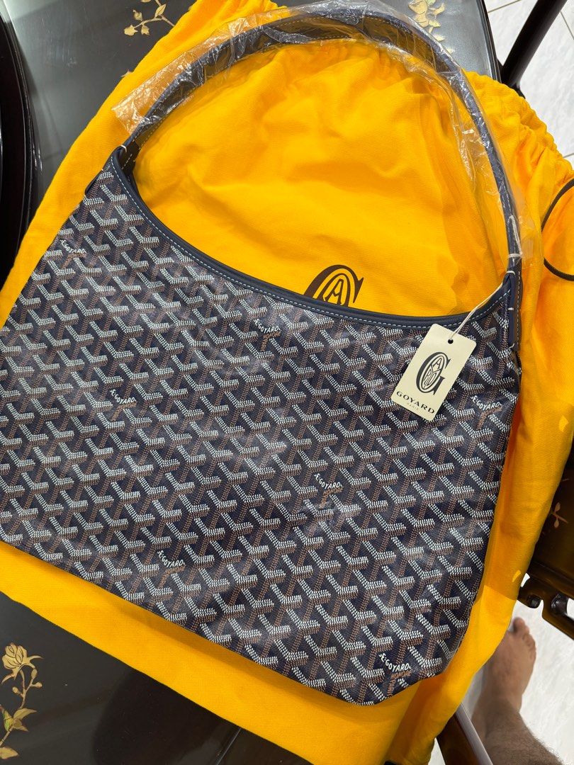 Goyard Boheme Navy Blue Bag (Category: Luxury Bags & Wallets) located in Consolacion. Submitted by corbo1027 (Listing ID 1415772344, Image 1). Description: - Authentic Goyard Saint Louis PM handbag - Signature Goyardine coated canvas - Navy blue leather strap and trim - Includes detachable pouch and dust bag - Made in France - Comes with tags and care booklet, receipt and paperbag - Purchased from Goyard Milan Store -Ships from Cebu 🇵🇭.