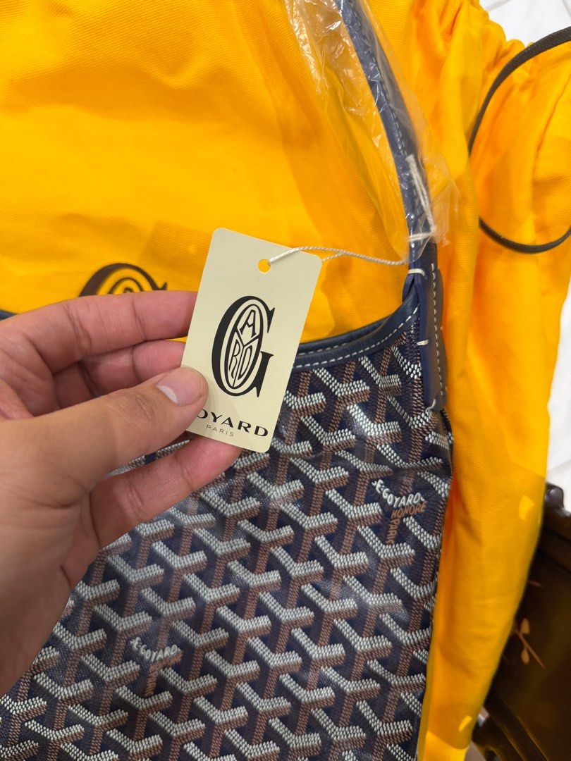 Goyard Boheme Navy Blue Bag (Category: Luxury Bags & Wallets) located in Consolacion. Submitted by corbo1027 (Listing ID 1415772344, Image 2). Description: - Authentic Goyard Saint Louis PM handbag - Signature Goyardine coated canvas - Navy blue leather strap and trim - Includes detachable pouch and dust bag - Made in France - Comes with tags and care booklet, receipt and paperbag - Purchased from Goyard Milan Store -Ships from Cebu 🇵🇭.