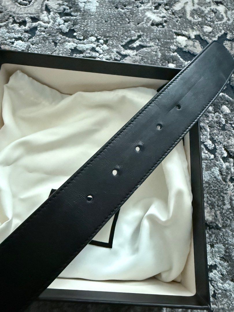 Authentic Gucci Pearl GG Belt (Category: Luxury Accessories) located in Manila. Submitted by annann1003 (Listing ID 1415776631, Image 3). Description: Authentic Gucci belt with pearl GG buckle. Black leather belt with gold-tone hardware. Includes original box and dust bag. Size 85-34. Made in Italy. The belt has several holes for adjustment. The buckle is adorned with pearls. The box has the Gucci logo..