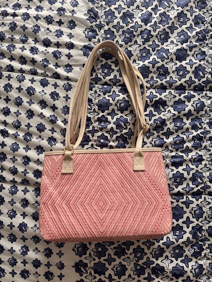 Halohalo Bag (Category: Shoulder Bags) located in Manila. Submitted by declutters137 (Listing ID 1415654481, Image 1). Description: - Pink woven shoulder bag - Features a diamond pattern - Beige strap and trim - Rectangular shape - Includes an interior pocket - Perfect for everyday use Selling this low Final price posted Used thrice max RFS; not my style.