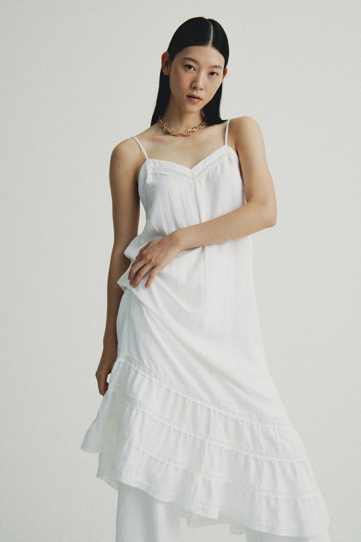H&M WHITE MAXI DRESS (Category: Dresses) located in Baguio. Submitted by page__three (Listing ID 1415538142, Image 2). Description: - For reference: bust is 34; waist 27 - This dress is size XS.