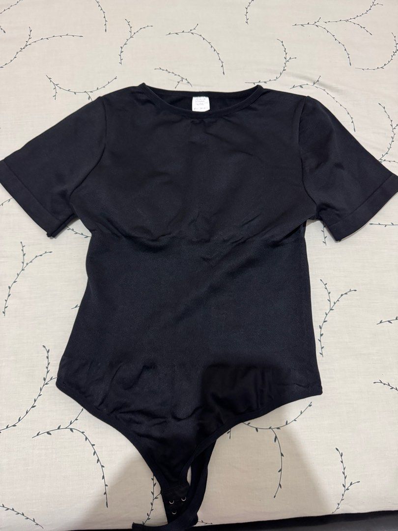 Hottie Diary Black Bodysuit (Category: Others Tops) located in Pateros City. Submitted by turtleyhappy (Listing ID 1415759424, Image 1). Description: - Black bodysuit - Short sleeves - Scoop neckline - Thong bottom with snap closure - Smooth, stretchy fabric - Versatile for layering or wearing alone.