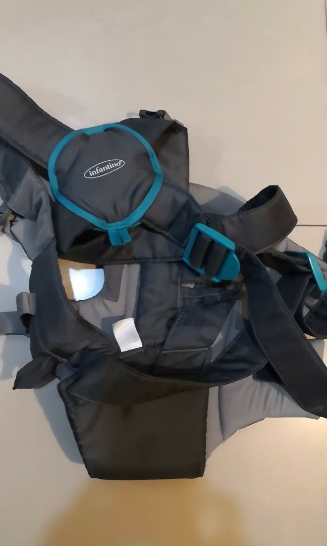 Infantino baby carrier (Category: Carriers & Slings) located in Marikina City. Submitted by lotsofdeclutter (Listing ID 1415654882, Image 2). Description: Infantino baby carrier (1-1yr and 6months depende sa laki ng baby mo) Super sarap ito sa katawan di sasakit likod mo s karga sa baby mo lalo na ko na may slip disc. Selling 800 orig price 2k(slightly use ng bunso lng).