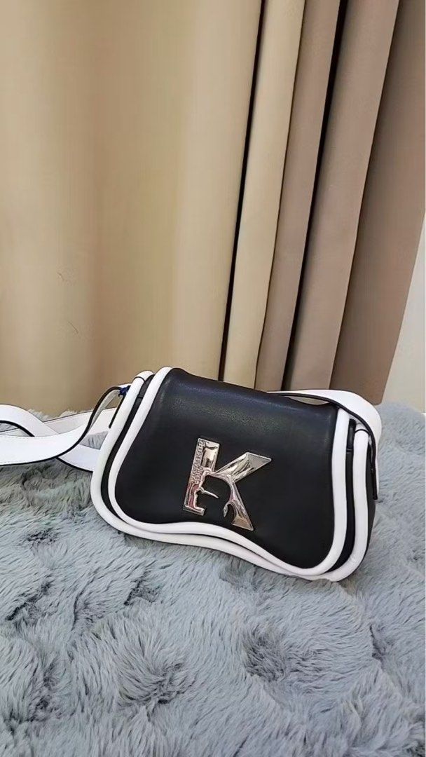 Karl Lagerfeld Sunglasses Crossbody Bag (Category: Luxury Bags & Wallets) located in Quezon City. Submitted by arterg (Listing ID 1415757021, Image 1). Description: almost new with tag srp $385usd selling low authentic small size farfetch price 21k .