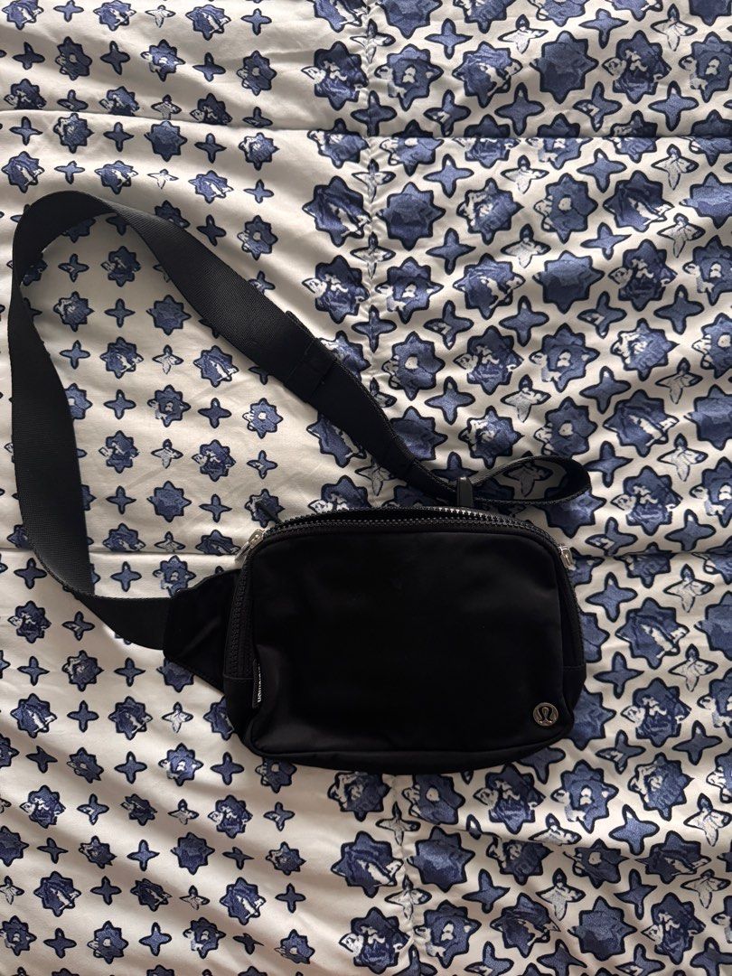 Lululemon Everywhere Belt Bag - Black (Category: Cross-body Bags) located in Manila. Submitted by declutters137 (Listing ID 1415654055, Image 1). Description: - Lululemon Everywhere Belt Bag - Color: Black - Adjustable strap for a comfortable fit - Zippered main compartment - Small exterior pocket - Features the Lululemon logo - Perfect for carrying essentials - Stylish and practical accessory Lululemon Bag RFS: not in use .