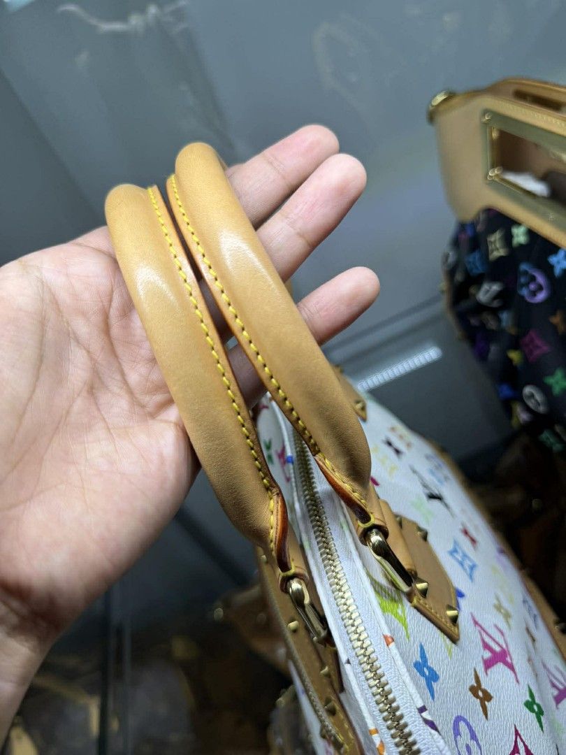 LV Murakami Alma White (Category: Luxury Bags & Wallets) located in Passi. Submitted by janbelisario (Listing ID 1415750608, Image 3). Description: Murakami Alma White (maputi) with dust bag GUARANTEED ORIGINAL crii.