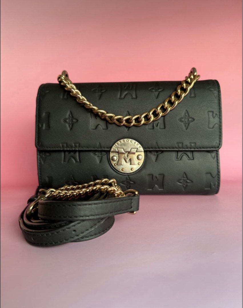 Metrocity impriente (Category: Luxury Bags & Wallets) located in Minglanilla. Submitted by cheechan07 (Listing ID 1415697749, Image 1). Description: Moving out sale. No issue just a light normal signs of used sa hardware. Leather is still 10/10 condition. Color is 10/10. Can fit iphone 16/17 promax and small umbrella. Best fit slim wallet. FREE SF..