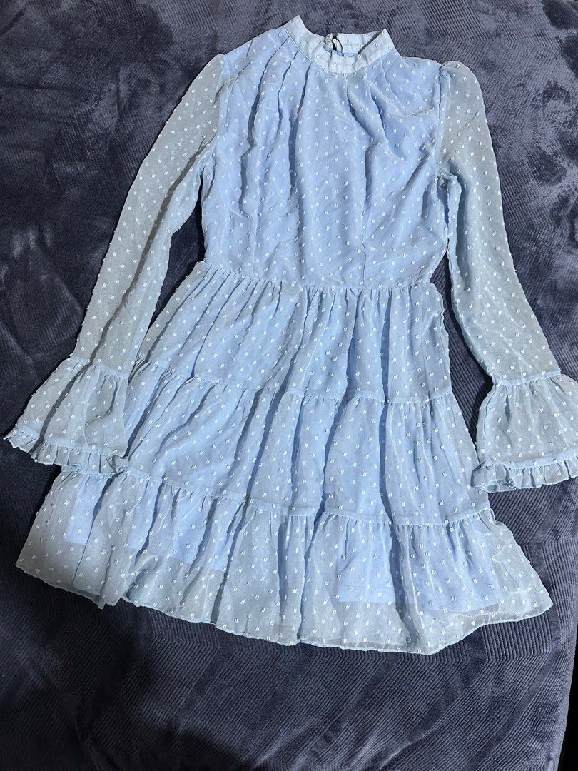 MISS Blue Tiered Dress (Category: Dresses) located in Baguio. Submitted by tamarands (Listing ID 1415722429, Image 1). Description: - Light blue tiered dress - Size: S - Features: - Long sleeves - Flared cuffs - High neckline - Back zipper closure - Brand tag visible.
