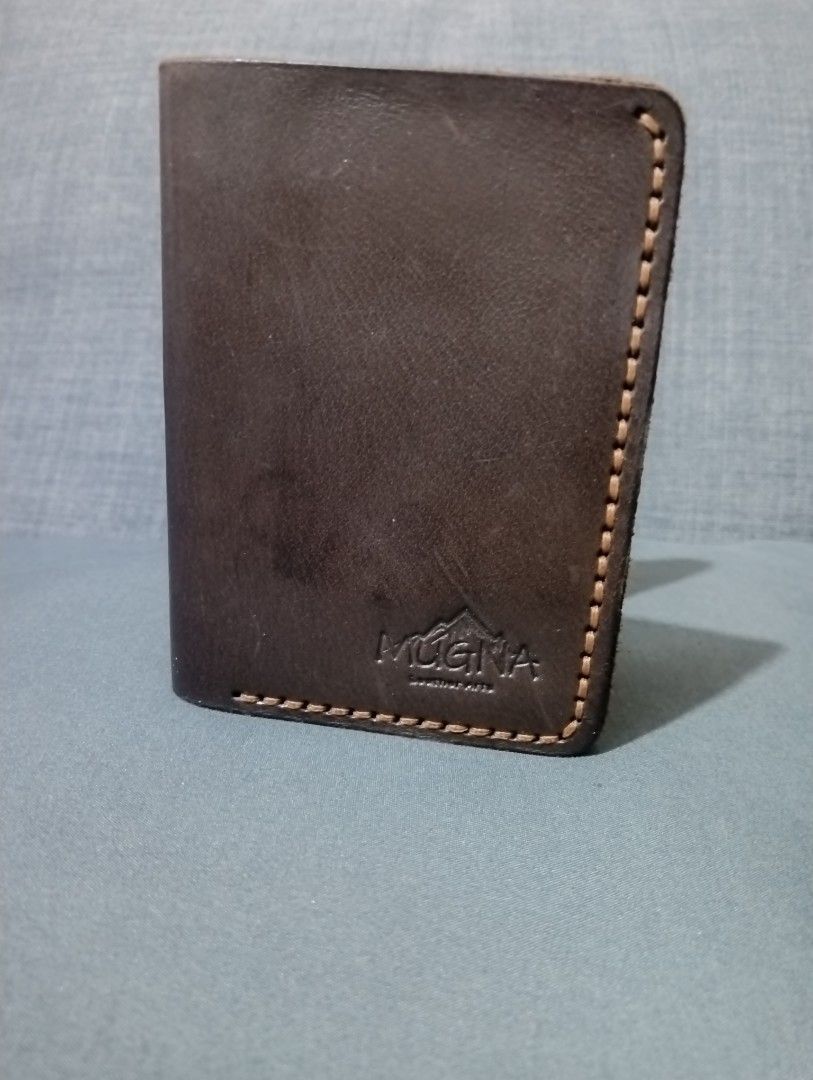 Mugna Handmade Genuine Leather Trifold Wallet (Category: Wallets & Card Holders) located in Hermosa. Submitted by chic2315 (Listing ID 1415810027, Image 2). Description: Mugna Leather Arts Genuine Leather trifold Wallet. It has 1 ID slot and 6 card holder. Local made and handmade po ito. Like new condition, halos di man po nagamit. Very durable po ito. RFS: Too many wallets.