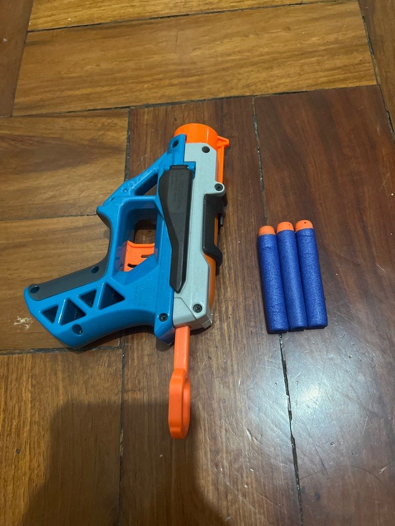 Nerf Crossbow Toy Gun (Category: Action & Battle Toys) located in Manila. Submitted by janaekpaj41634 (Listing ID 1415767474, Image 1). Description: RFS: decluttering; not in use Damages: No visible damage on gun itself, but the darts have minor dents. Payment: Upfront, negotiable price - Nerf crossbow toy gun - Includes 3 darts - Color scheme: Blue, orange, and gray - Features a sight and handle - In good working condition - Ready for play.