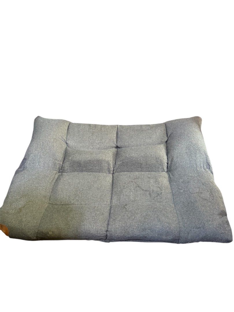 NITORI Floor Sofa Bed 54x42 inches (Category: Sofas) located in Quezon City. Submitted by mikesiawingco (Listing ID 1415758007, Image 2). Description: - NITORI floor sofa bed - Color: Gray - Folds flat for easy storage - Dimensions: 54x42 inches - Features a cushioned backrest - Includes armrests - Made with textured fabric.