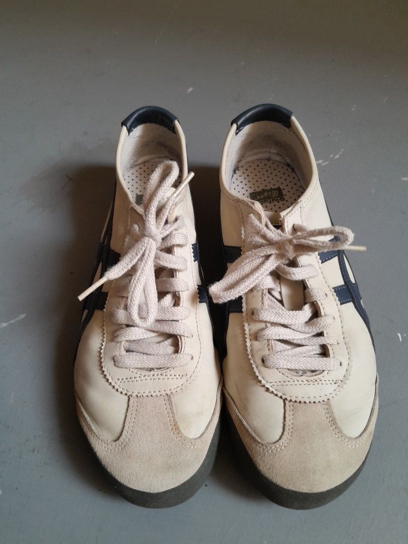Onitsuka Tiger MEXICO 66 Birch/Peacoat Sneakers (Category: Sneakers) located in Singapore. Submitted by reich (Listing ID 1415643983, Image 2). Description: AI Overview This is a pair of Onitsuka Tiger Mexico 66 sneakers in the "Birch/Peacoat" colorway, featuring a leather upper with suede overlays and a rubber sole. Classic Onitsuka Tiger MEXICO 66 NM sneakers in Birch/Peacoat colorway. Features a leather upper with suede toe cap. Size is 27.5 C