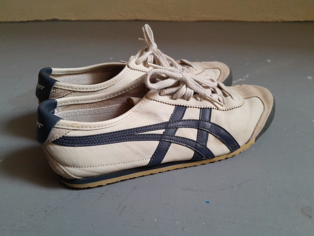 Onitsuka Tiger MEXICO 66 Birch/Peacoat Sneakers (Category: Sneakers) located in Singapore. Submitted by reich (Listing ID 1415643983, Image 3). Description: AI Overview This is a pair of Onitsuka Tiger Mexico 66 sneakers in the "Birch/Peacoat" colorway, featuring a leather upper with suede overlays and a rubber sole. Classic Onitsuka Tiger MEXICO 66 NM sneakers in Birch/Peacoat colorway. Features a leather upper with suede toe cap. Size is 27.5 C