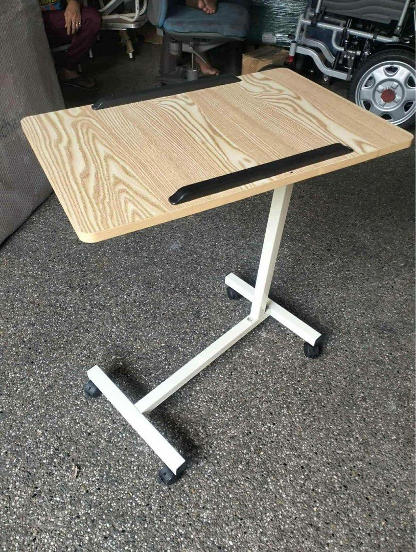 over bed table (Category: Medical Supplies & Tools) located in Manila. Submitted by yolitacado18248 (Listing ID 1415650267, Image 1). Description: brandnew adjustable same day delivery .