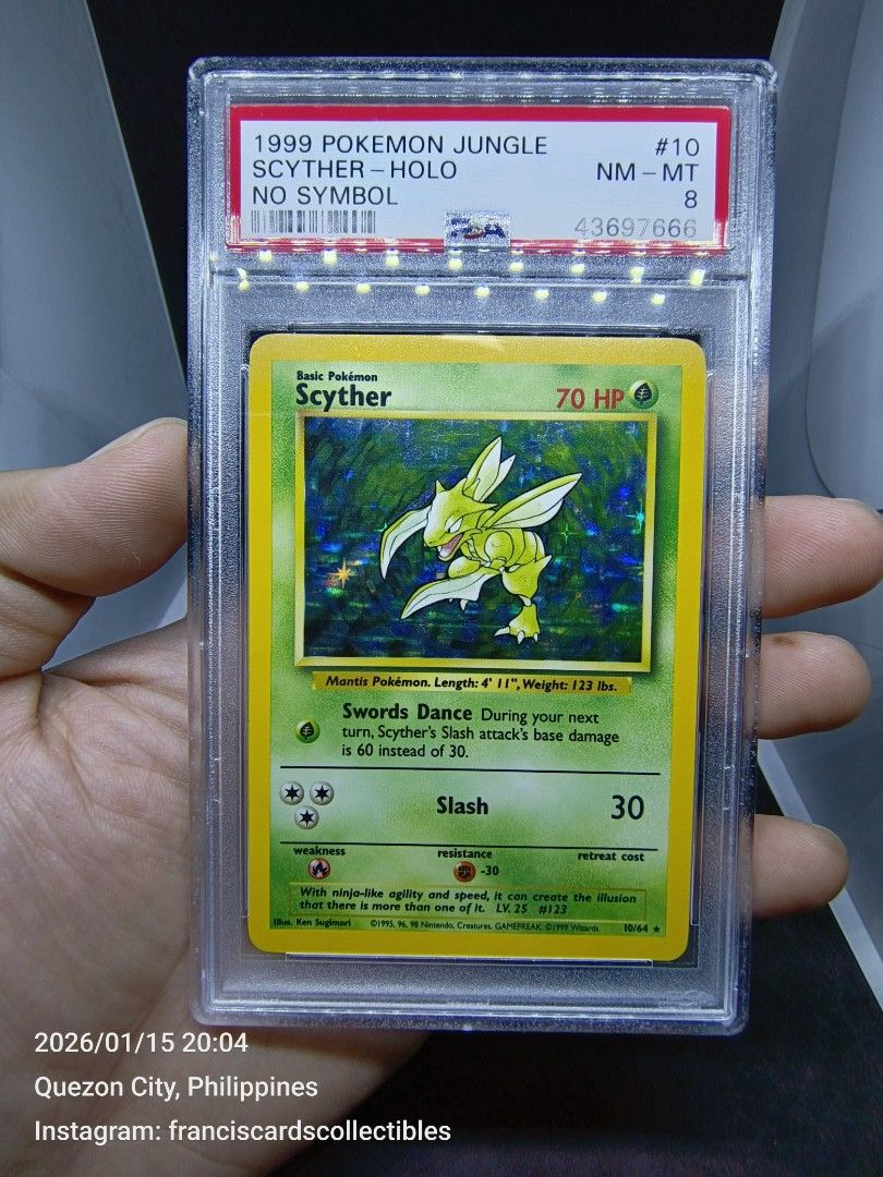 Pokemon Card - PSA 8 SCYTHER #10 - HOLO (JUNGLE: "NO SYMBOL") YEAR 1999 (Category: Graded Singles) located in Quezon City. Submitted by 710francis (Listing ID 1415753061, Image 2). Description: *8,880 Pesos *JUNGLE: "NO SYMBOL" / YEAR 1999 *PSA 8 (NEAR MINT-MINT) *SCYTHER #10 - HOLO *JUST MESSAGE FOR MORE INQUIRIES....