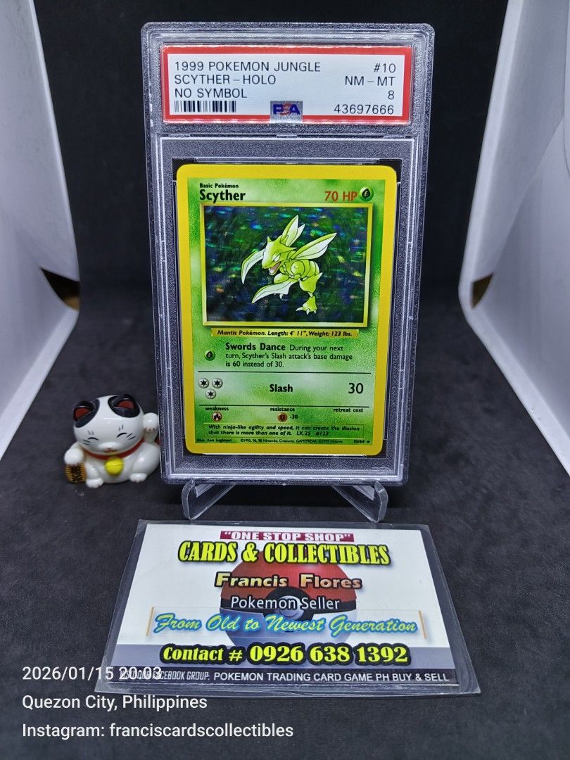 Pokemon Card - PSA 8 SCYTHER #10 - HOLO (JUNGLE: "NO SYMBOL") YEAR 1999 (Category: Graded Singles) located in Quezon City. Submitted by 710francis (Listing ID 1415753061, Image 1). Description: *8,880 Pesos *JUNGLE: "NO SYMBOL" / YEAR 1999 *PSA 8 (NEAR MINT-MINT) *SCYTHER #10 - HOLO *JUST MESSAGE FOR MORE INQUIRIES....