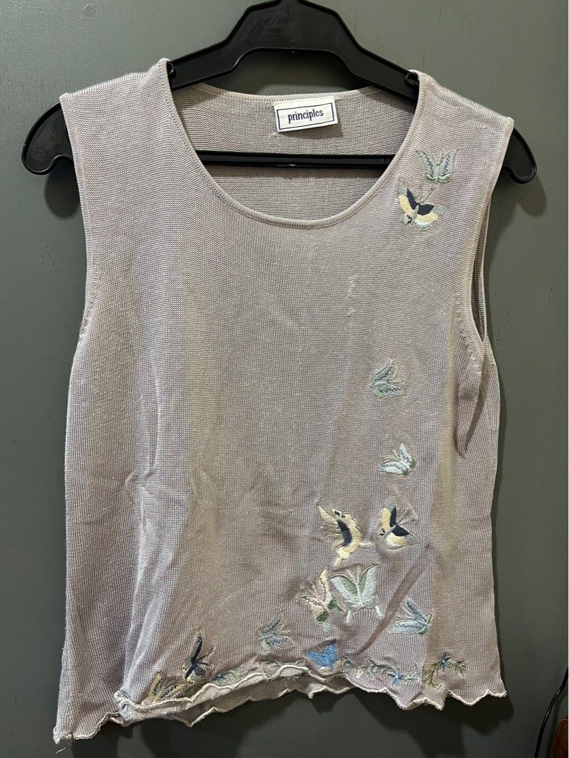 Principles Sleeveless Top with Embroidery (Preloved) (Category: Sleeveless) located in Quezon City. Submitted by ntryv (Listing ID 1415812080, Image 1). Description: DETAILS - Principles sleeveless top - Unique embroidered design 🦋 - Scoop neckline - Scalloped hem - Neutral color - Lightweight knit material - Plain back - Ideal for warm weather - Good to M-L pictures are captured with and without flash Mix & match: Buy any 2 items priced at ₱30 