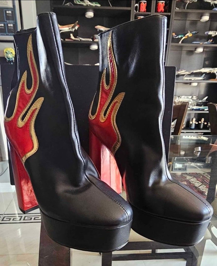 Public Desire Heeled Boots (Category: Boots) located in Tagaytay City. Submitted by android011 (Listing ID 1415646444, Image 1). Description: Public Desire Heeled Boots Flame Design Leather Size: US 6/ UK 5 From US NEW For pick up only.
