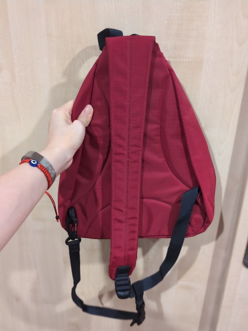 Samsonite Red Sling Backpack (Category: Backpacks) located in Manila. Submitted by liannemelody (Listing ID 1415773642, Image 2). Description: - Samsonite red sling backpack - Single strap design - Main compartment with zipper closure - Additional front pocket - Padded back for comfort - Adjustable strap - Durable, water-resistant material.