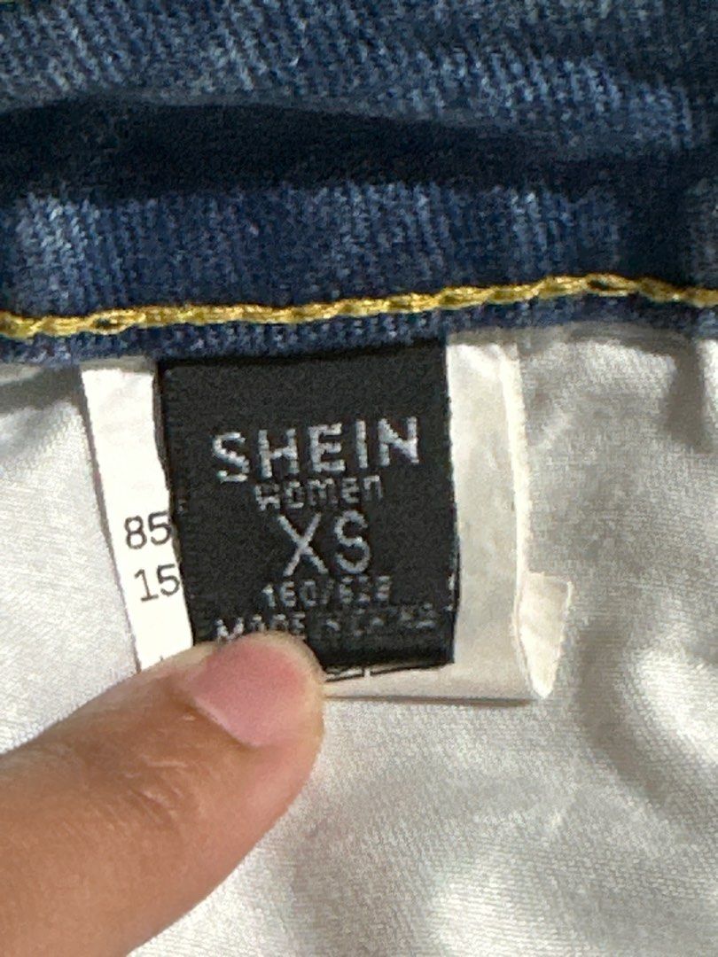 SHEIN Distressed Denim Shorts XS (Category: Shorts) located in Baguio. Submitted by tamarands (Listing ID 1415727422, Image 2). Description: - SHEIN light wash denim shorts - Distressed design with rips and frayed edges - Classic five-pocket styling - Button and zipper closure - Size XS.