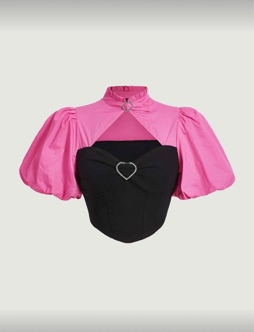 Shein Pink Puff Sleeve Top (Category: Blouses) located in Pasig City. Submitted by martinasummer13 (Listing ID 1415658523, Image 2). Description: - Shein top - Pink puff sleeves - Black corset-style bodice - Heart-shaped buckle detail - High collar - Satin-like fabric - Unique and stylish.